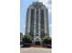 Contemporary high-rise condo building with private balconies and manicured landscaping at 795 Hammond Dr # 2007, Atlanta, GA 30328