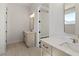 Bright bathroom featuring dual sinks with white countertops and stylish gold hardware at 505 Godfrey Dr, Cumming, GA 30040
