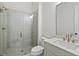 Bathroom featuring a glass shower, toilet, vanity and bright, natural light at 505 Godfrey Dr, Cumming, GA 30040