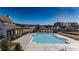 View of the sparkling community pool offers a refreshing escape for residents with stylish houses in the background at 505 Godfrey Dr, Cumming, GA 30040