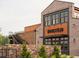 Striking brick building exterior with modern industrial design and outdoor staircase at 505 Godfrey Dr, Cumming, GA 30040