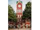 Classic City Hall exterior featuring a prominent clock tower and traditional brick architecture at 505 Godfrey Dr, Cumming, GA 30040