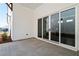 Covered patio with sliding glass doors and a serene view at 505 Godfrey Dr, Cumming, GA 30040