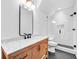 Clean bathroom with white subway tile shower, wood vanity, and marble top at 103 Arbor Oaks Dr, Canton, GA 30115