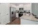 Kitchen features stainless steel appliances, and granite countertops at 5895 Mattan Trl, Lithonia, GA 30058