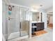 Bathroom with walk-in shower and double vanity at 90 Piedmont Cir, Covington, GA 30016