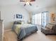 Comfortable bedroom with a double bed and sitting area at 90 Piedmont Cir, Covington, GA 30016