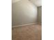 Large empty bedroom with neutral colored walls and carpeting at 90 Piedmont Cir, Covington, GA 30016