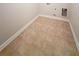 Bright laundry room with tile floor and utility connections at 90 Piedmont Cir, Covington, GA 30016