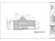 Two-story brick home with a three-car garage and detailed architectural features at 1077 Sweet Mia Ln, Powder Springs, GA 30127