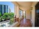 Terracotta tiled balcony with metal railing offering neighborhood views at 211 Colonial Homes Dr # 2304, Atlanta, GA 30309
