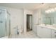 Spacious white bathroom featuring a shower, a toilet, and and sink at 211 Colonial Homes Dr # 2304, Atlanta, GA 30309