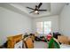 Bright bedroom with tray ceiling, fan, and large window allowing for plenty of natural light at 211 Colonial Homes Dr # 2304, Atlanta, GA 30309