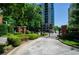 Gated entrance to property with mature landscaping and secure access at 211 Colonial Homes Dr # 2304, Atlanta, GA 30309