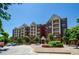 Beautiful brick apartment building featuring private balconies and well-manicured landscaping at 211 Colonial Homes Dr # 2304, Atlanta, GA 30309