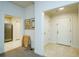 Hallway that opens into the kitchen and the front door at 211 Colonial Homes Dr # 2304, Atlanta, GA 30309