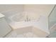 Close up of clean white jacuzzi tub with silver faucet in a clean bathroom at 211 Colonial Homes Dr # 2304, Atlanta, GA 30309