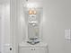 Vanity with vessel sink and a large mirror at 2960 S Pharr Nw Ct # N2, Atlanta, GA 30305