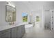 Luxurious bathroom with soaking tub, double vanity, and walk-in shower at 5693 Brendlynn Dr, Suwanee, GA 30024