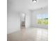 Bedroom with en-suite bathroom and window view at 5693 Brendlynn Dr, Suwanee, GA 30024