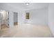 Bright bedroom with window and access to closet at 5693 Brendlynn Dr, Suwanee, GA 30024