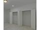Spacious walk-in closets with built-in shelving at 5693 Brendlynn Dr, Suwanee, GA 30024