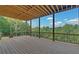 Spacious deck with a view of the wooded area at 5693 Brendlynn Dr, Suwanee, GA 30024
