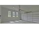 Bright garage with automatic door opener at 5693 Brendlynn Dr, Suwanee, GA 30024