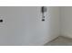 Garage with ample space and wall outlets at 5693 Brendlynn Dr, Suwanee, GA 30024
