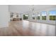 Open concept kitchen with island and access to deck at 5693 Brendlynn Dr, Suwanee, GA 30024