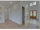 Bright study with hardwood floors and built-in shelving at 5693 Brendlynn Dr, Suwanee, GA 30024