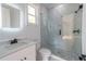 The bathroom includes a tiled shower, toilet, vanity, and light-up mirror at 2861 Tree Top Rd, Dacula, GA 30019