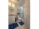 Modern bathroom with a sleek vanity, walk-in shower, and stylish fixtures at 3898 Ridge Rd, Buford, GA 30519