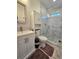 Elegant bathroom features modern fixtures, white marble shower, and ample cabinet space at 3898 Ridge Rd, Buford, GA 30519