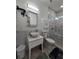 Renovated bathroom with glass shower door and stylish vanity at 3898 Ridge Rd, Buford, GA 30519