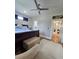 Relaxing bedroom featuring hardwood floors, a comfortable armchair, and great natural light at 3898 Ridge Rd, Buford, GA 30519