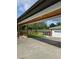 Carport featuring a view of the fenced in backyard and detached garage at 3898 Ridge Rd, Buford, GA 30519