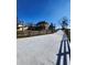Scenic view of a charming home with a long driveway and well-maintained fences at 3898 Ridge Rd, Buford, GA 30519