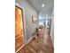 Inviting hallway with polished wood floors at 3898 Ridge Rd, Buford, GA 30519