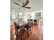 Modern eat-in kitchen with wood floors, stainless steel appliances and an island with bar seating at 3898 Ridge Rd, Buford, GA 30519