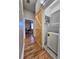 Convenient in-unit laundry with a stackable washer and dryer and a sliding barn door at 3898 Ridge Rd, Buford, GA 30519
