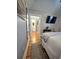 Bedroom with a walk-in bathroom and hardwood floors at 3898 Ridge Rd, Buford, GA 30519