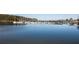 Picturesque marina with yachts docked, reflecting on the calm lake surface at 3898 Ridge Rd, Buford, GA 30519