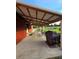 Covered patio area providing shade and space for outdoor seating and relaxation at 3898 Ridge Rd, Buford, GA 30519