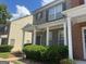 Charming two-story brick house with a welcoming front porch and well-maintained landscaping at 4870 Hairston Park Sq, Stone Mountain, GA 30083