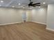 Finished basement with high ceilings, neutral walls, and hardwood floors at 408 Autry St, Norcross, GA 30071