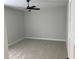 Spacious bedroom with ceiling fan and neutral carpeting at 408 Autry St, Norcross, GA 30071
