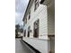 White house with brown accents and black windows at 408 Autry St, Norcross, GA 30071