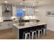 Modern kitchen with white cabinets, large island, and stainless steel appliances at 408 Autry St, Norcross, GA 30071