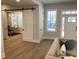 Living room with sliding barn door and hardwood floors at 408 Autry St, Norcross, GA 30071